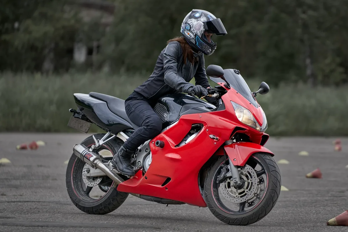 Riding safety training: low-speed riding between cones on the practice site – balance, clutch and vision at walking pace.